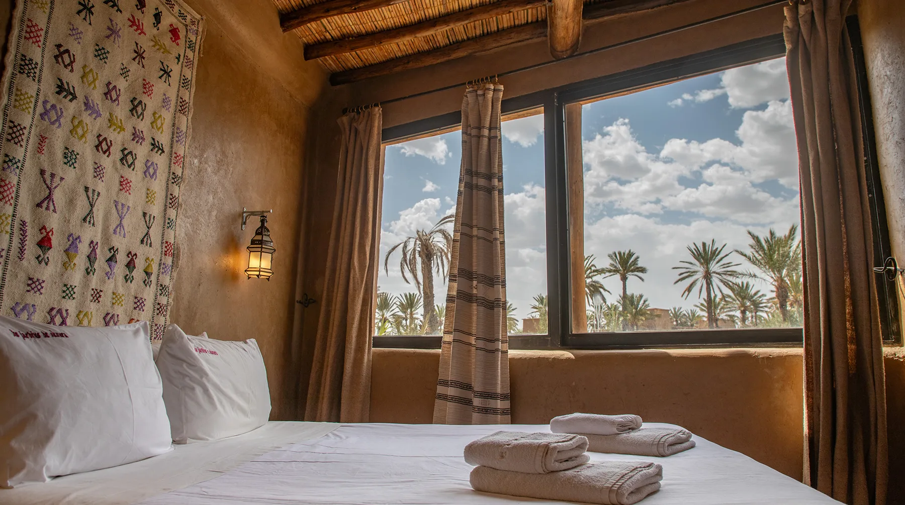 Room overlooking palms at Les Jardins de Skoura