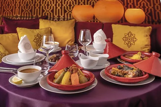 A Moroccan table with bread and tagines